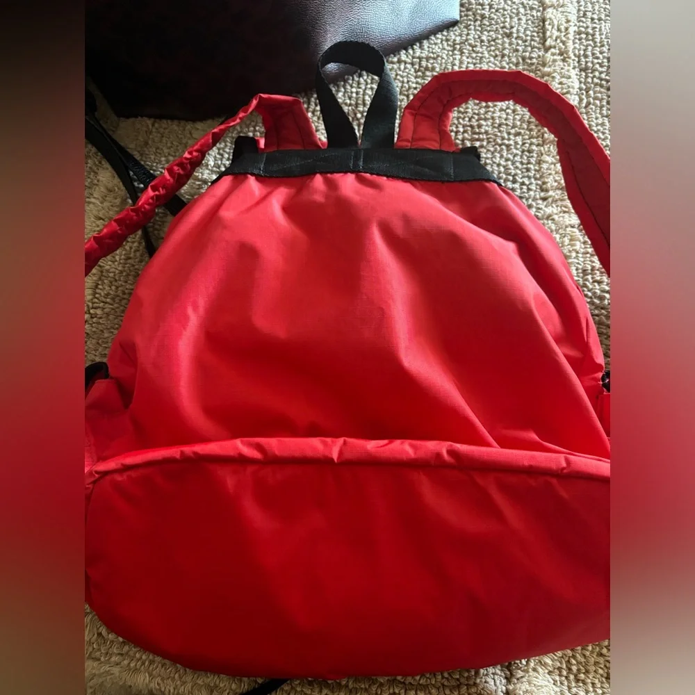 Lesportsac Red Nylon Backpack with Black Trim and Front Pockets - Picture 2 of 8